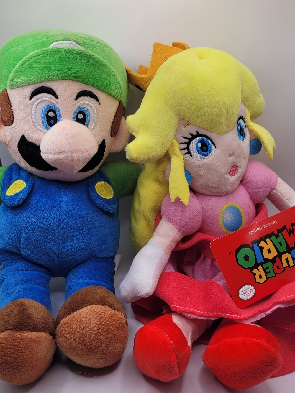 set/2 officially licensed Super Mario plush toys featuring Luigi Princess Peach